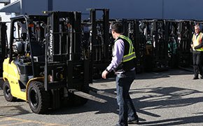 Blended forklift instructor training session outdoors