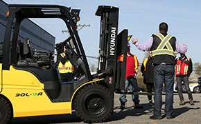 Blended forklift group training outdoors