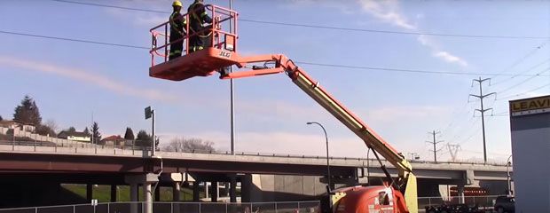 Instructors training on an elevated work platform