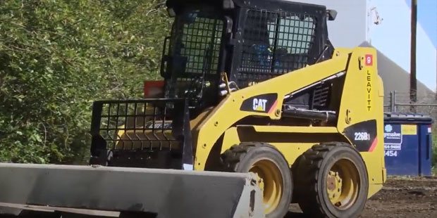Skid steer training in a construction yard
