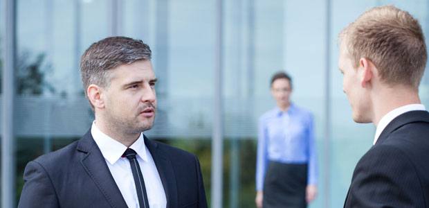 Workers practicing sales training