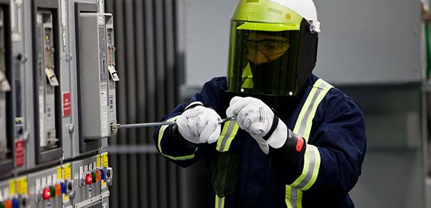 Electrical worker wearing safety equipment