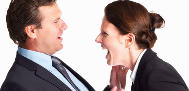 Woman yelling at a coworker and perpetuating  workplace violence