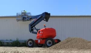 An operator completing an Energy Safety Canada training course on a boom lift