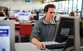 Man doing online training at a computer