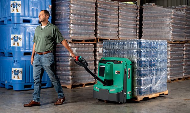 Operator training on an electric pallet jack in a warehouse