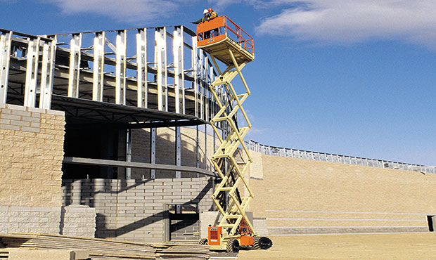 Operators trained on using a scissor lift at a construction site
