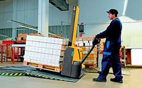 Operator training of a walkie stacker in a warehouse